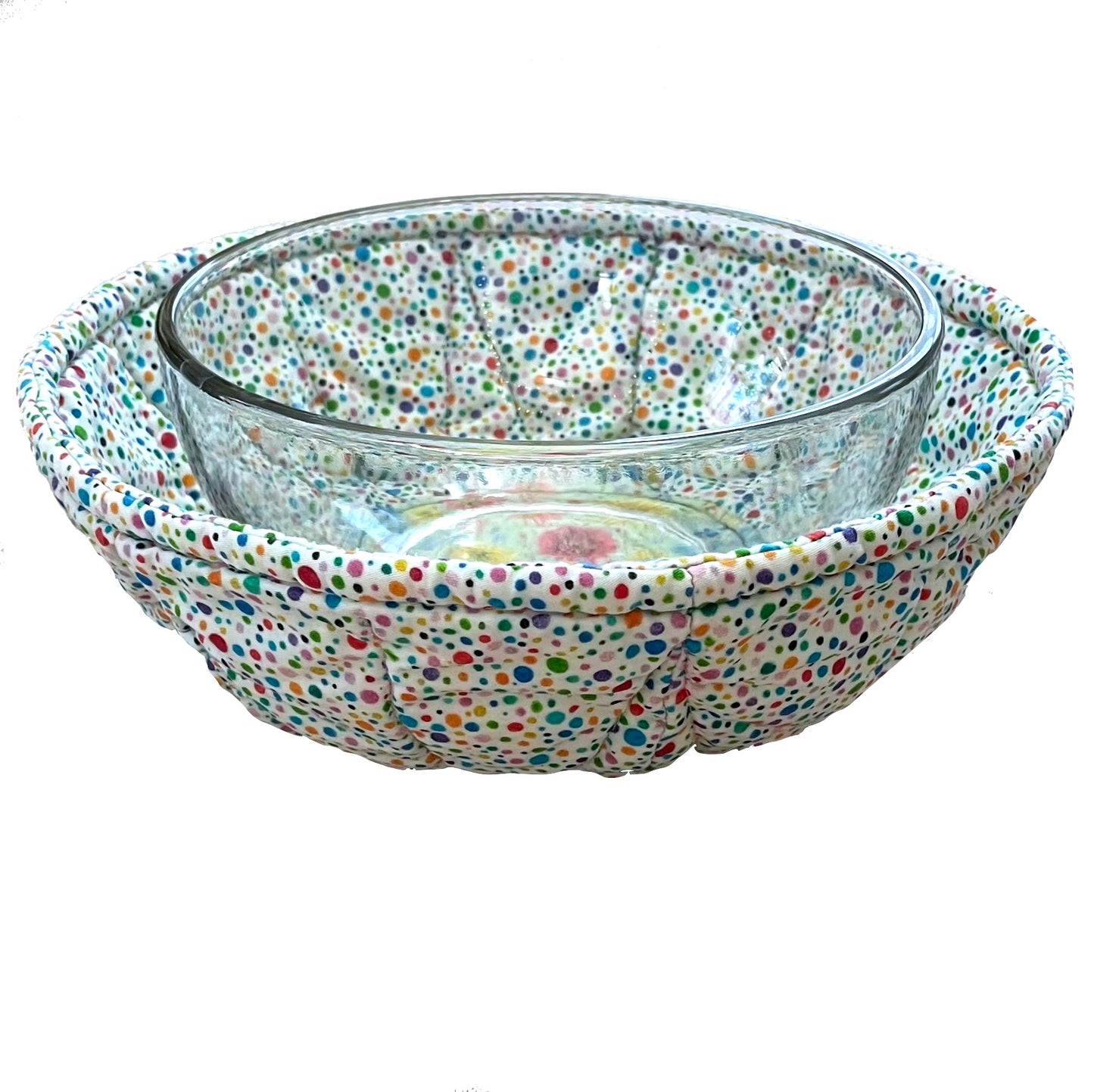 Bowl cozy in rainbow polka dots and floral design with clear bowl inside.