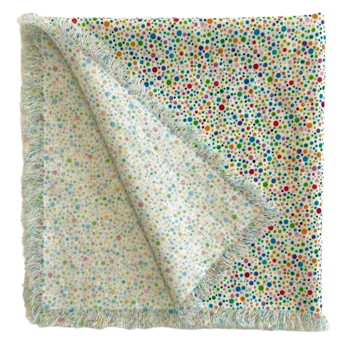 cloth napkin frayed in rainbow dots design