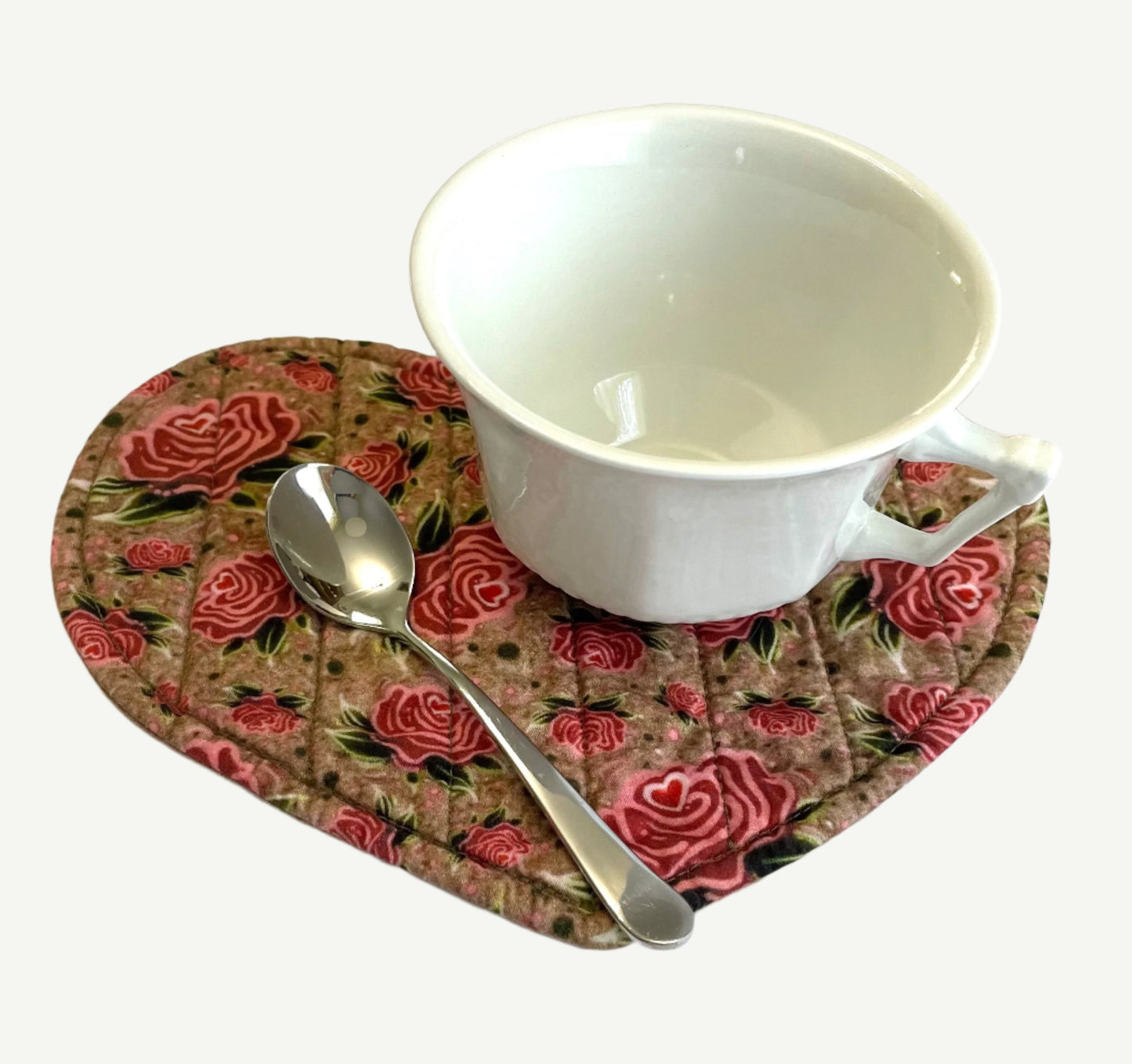 Heart-shaped quilted mug mat, mini mat, saucer mat, coaster in rose design.