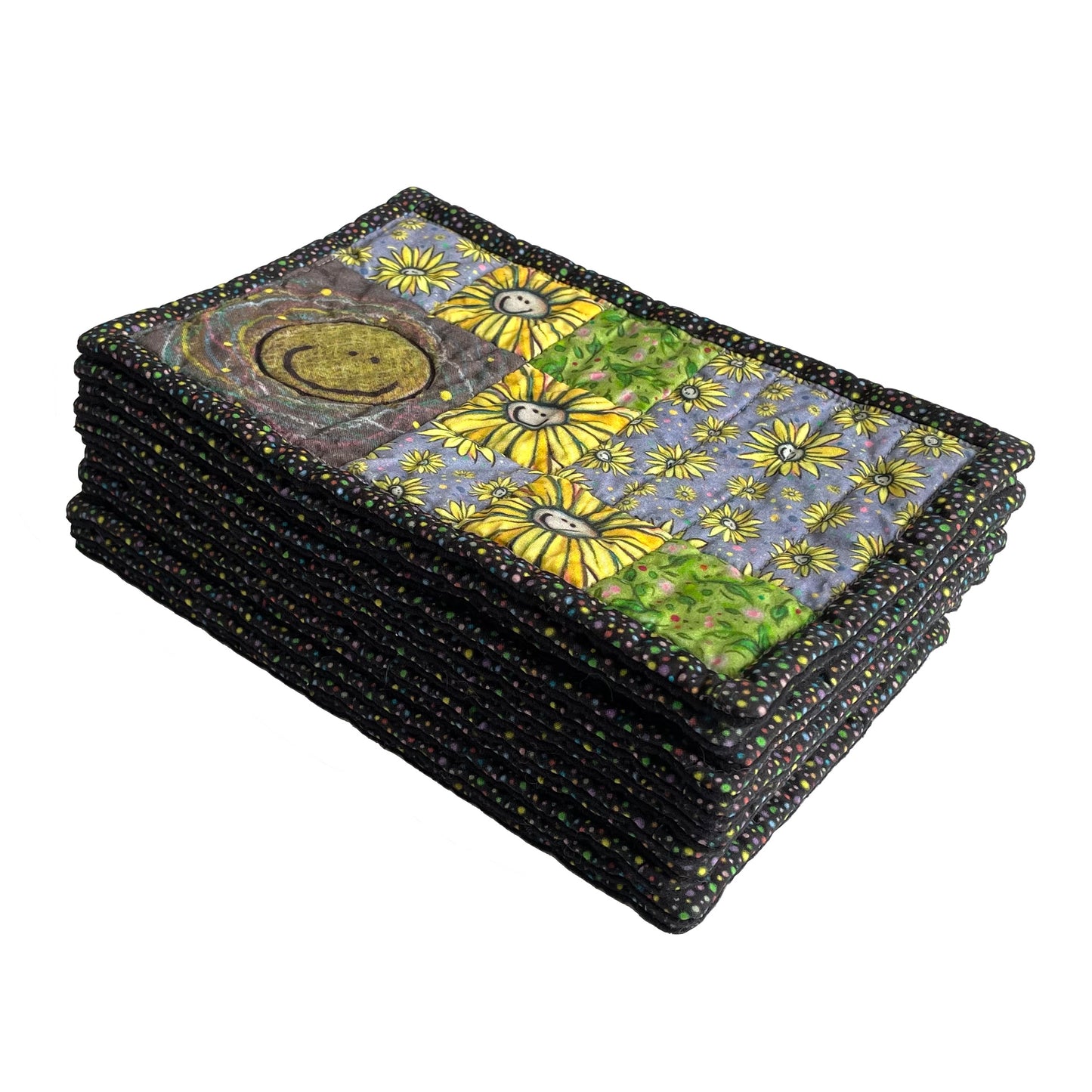 Stack of rectangle mug mats, mini mats, snack mats, coasters in smiley design with smiling flowers and black and rainbow polka dot border.