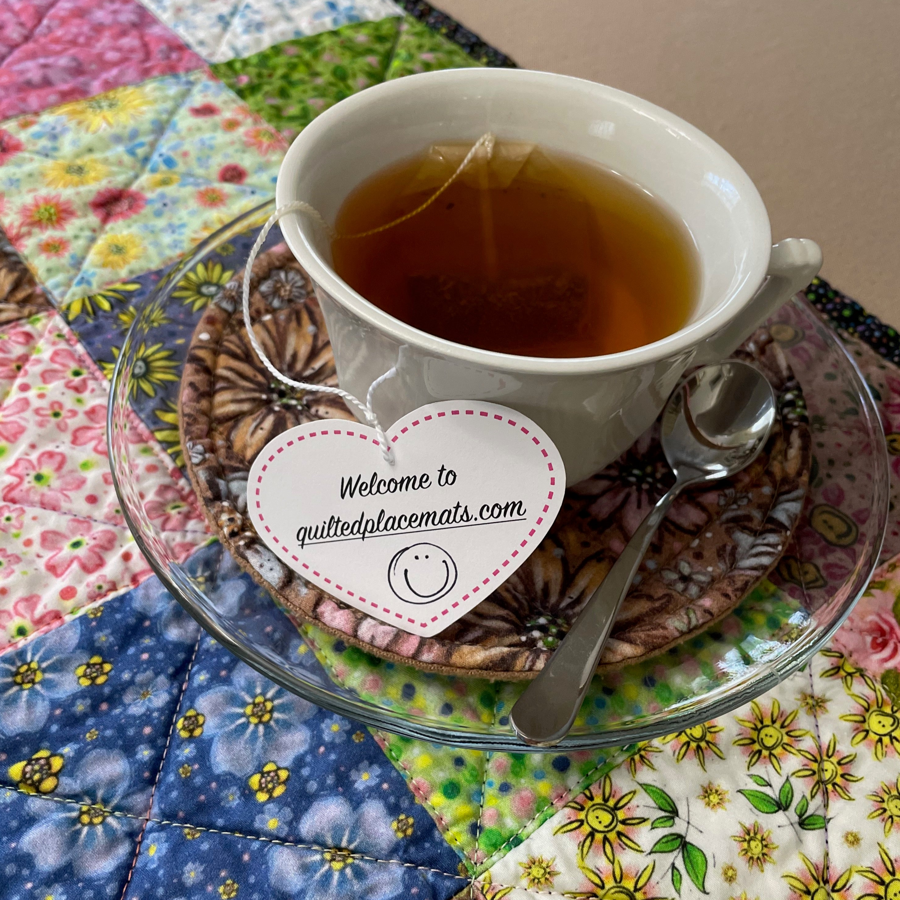 welcome to quiltedplacemats.com teacup on placemat